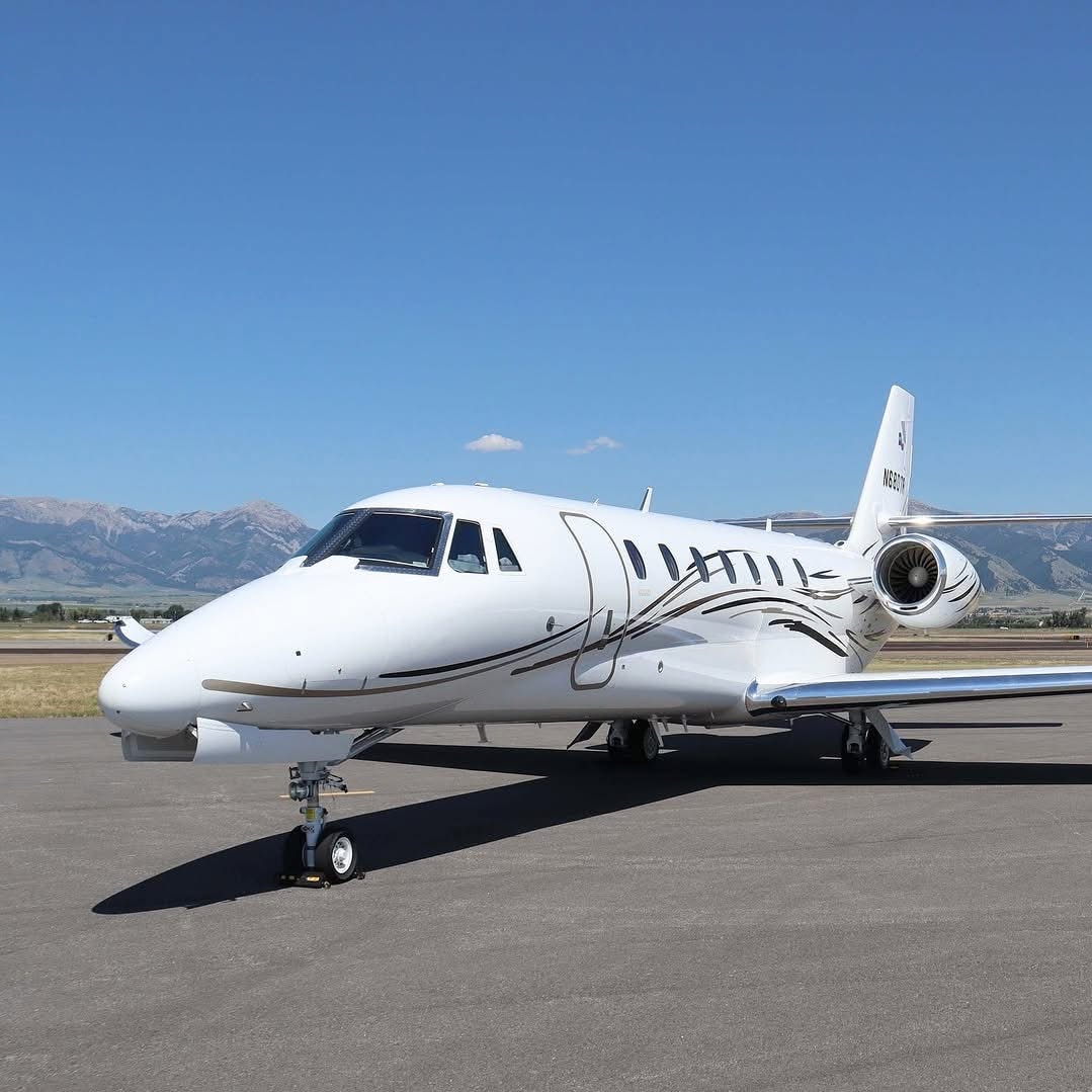 Citation parked against the mountains