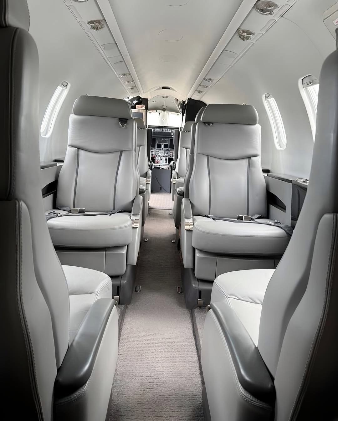 Light-jet club seating toward the flight deck
